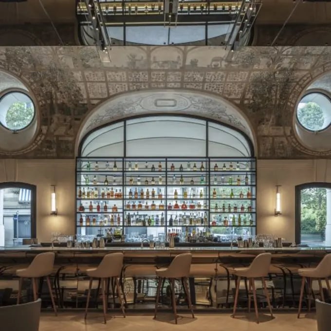 © Hotel Lutetia  —  Dramatic atrium-style interiors at Bar Joséphine